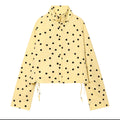Limone Polka Dot Jacket — chaqueta amarilla con polka dots negros de Velvet Boutique, vista de la pieza