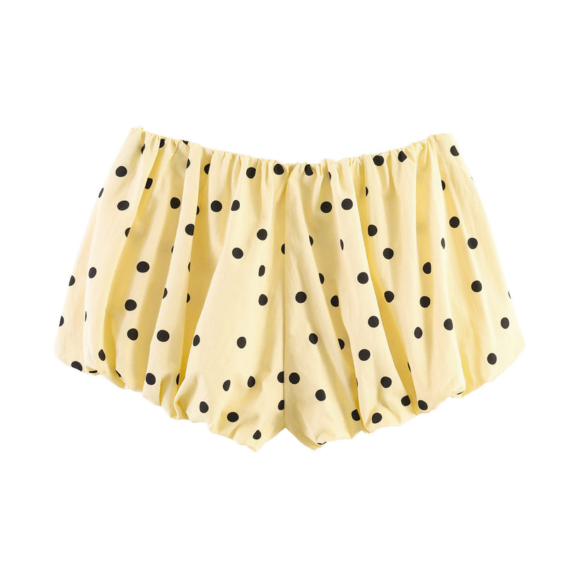 Limone Polka Dot Skirt — falda amarilla con polka dots negros de Velvet Boutique, vista de la pieza